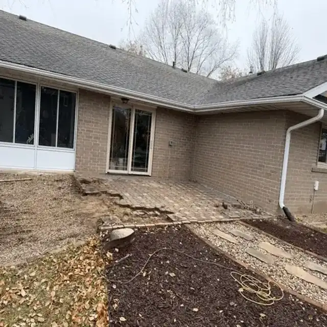Backyard before paver patio installation