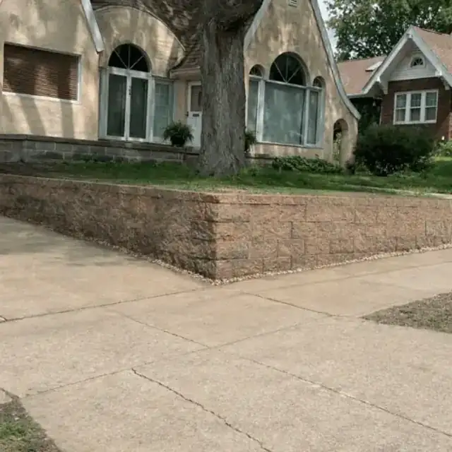 Completed retaining wall with clean finish