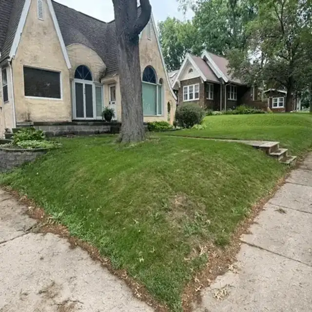 Backyard slope before retaining wall installation