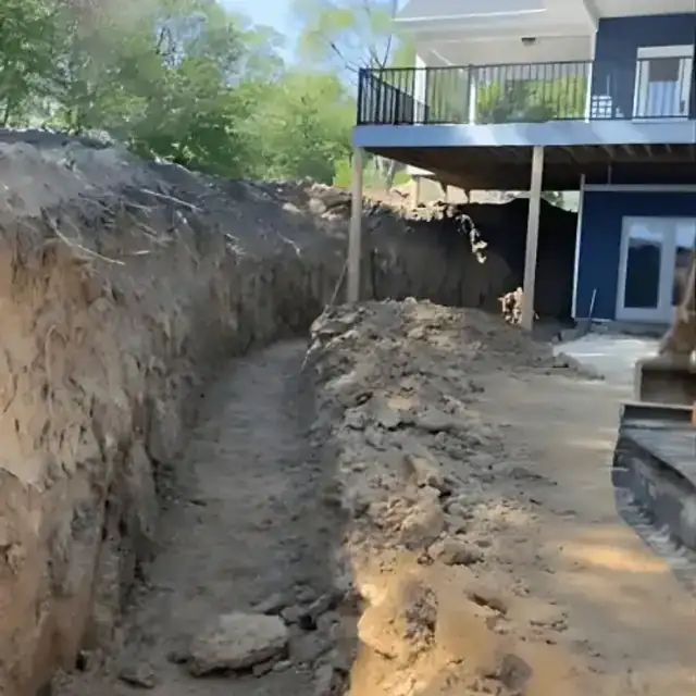 Yard before retaining wall installation in Cedar Falls